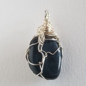 Handmade wire wrapped pendant dark blue stone silver tone